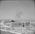 4.5 inch AA gun in action Malta 10-06-1942 IWM GM 935.jpg