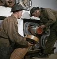 428 Battery crew handling 8-inch gun propellant charges WWII IWM TR 571.jpg