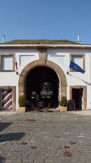 "Písek Gate is a former city gate of Baroque fortification of Prague."