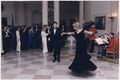 Photograph of Princess Diana dancing with John Travolta at a White House dinner for the Prince and Princess of Wales - NARA - 198569.jpg